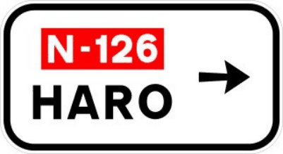 S-348 Señalización de salida inmediata, con cartel lateral, en carretera convencional o carretera multicarril hacia carretera convencional o carretera multicarril