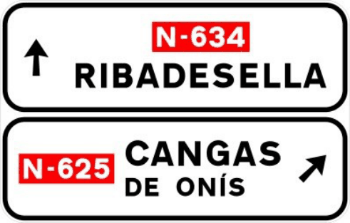 S-348a Señalización de salida inmediata, con cartel lateral, en carretera convencional o carretera multicarril hacia carretera convencional o carretera multicarril y dirección propia