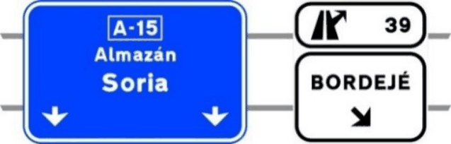 S-352a Señalización de salida inmediata, con carteles sobre la calzada, en autopista o autovía hacia carretera convencional o carretera multicarril y dirección propia