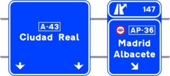 S-353a Señalización de salida inmediata, con carteles sobre la calzada, en autopista o autovía hacia autopista o autovía y dirección propia